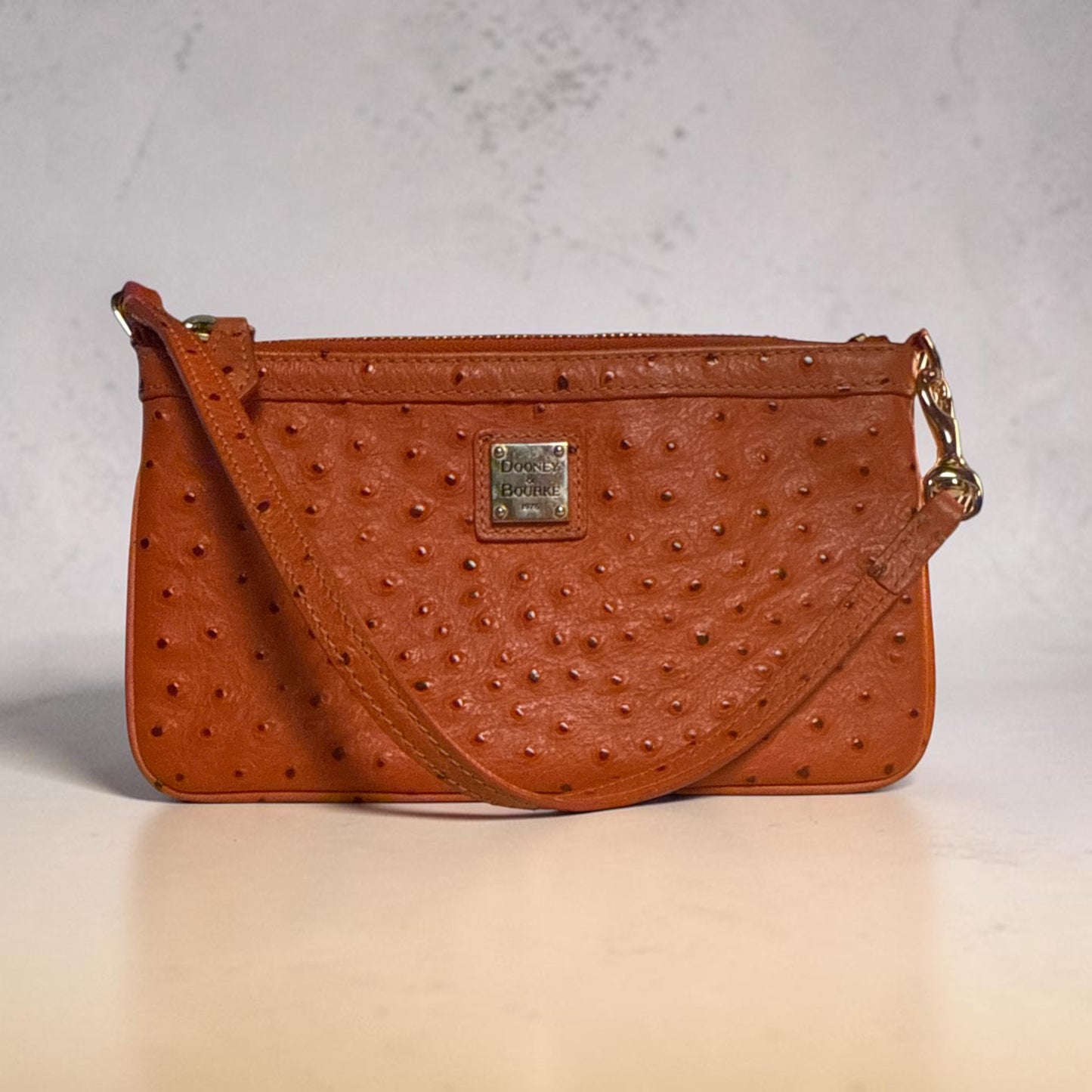 Dooney & Bourke Orange Ostrich-Embossed Wristlet