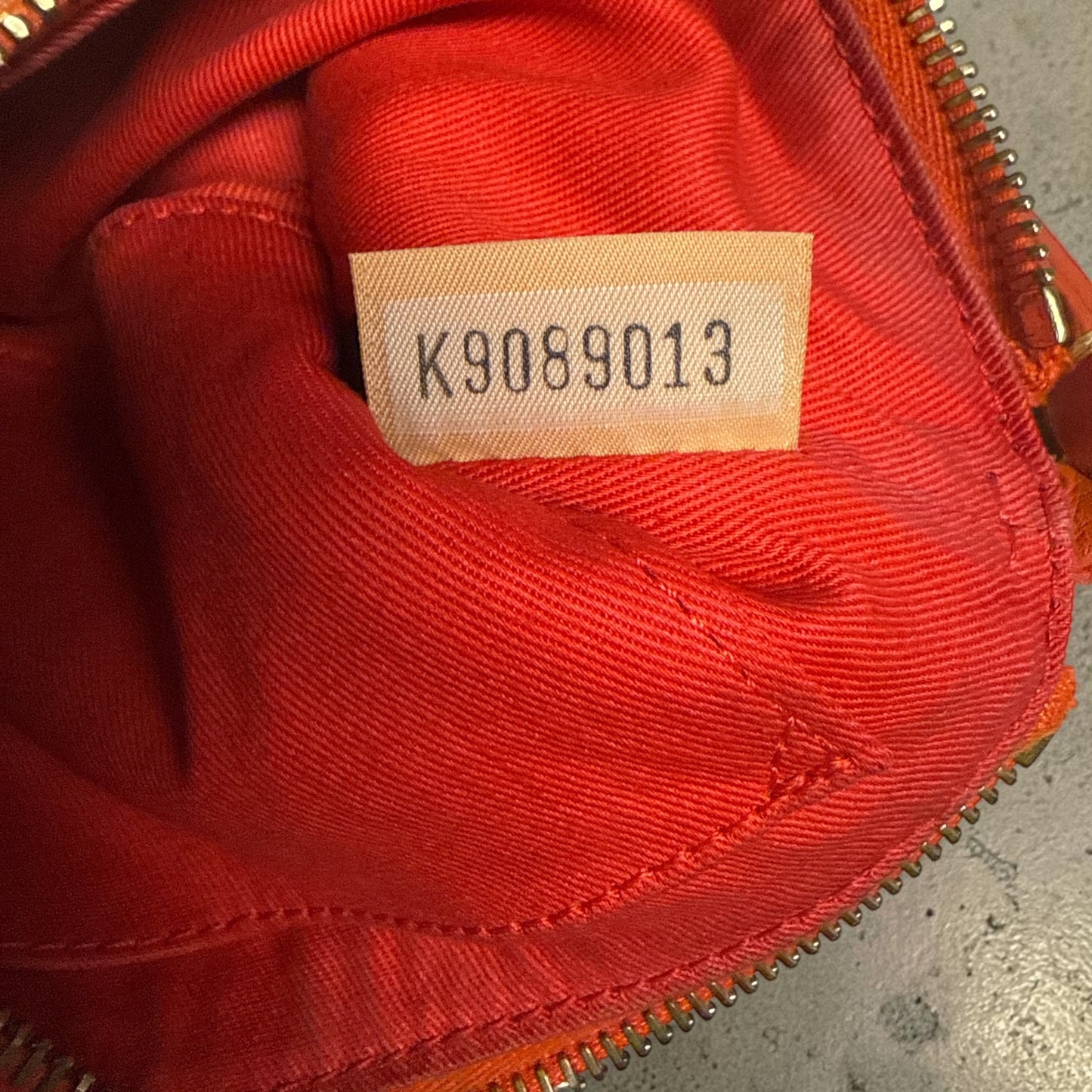 Dooney & Bourke Orange Ostrich-Embossed Wristlet
