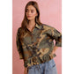 CAMO PRINTED RUFFLED HEM BUTTON DOWN BLOUSE